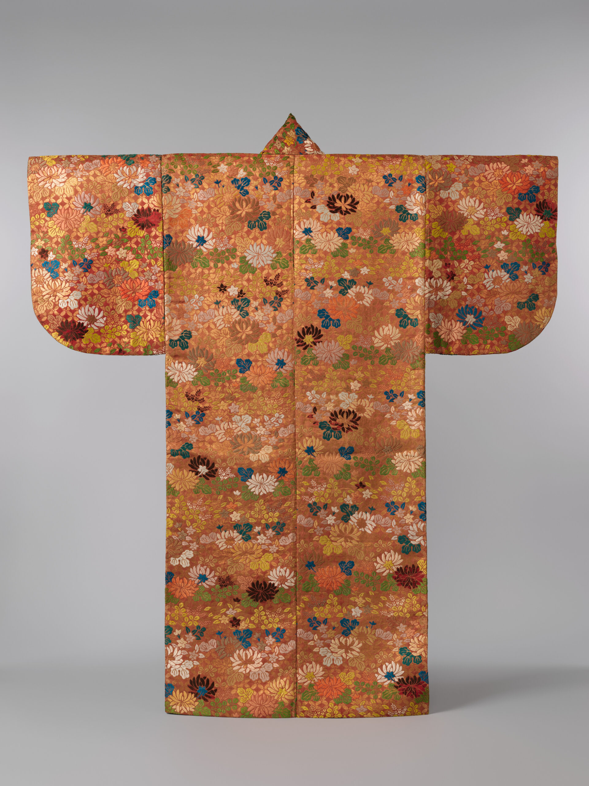 A detailed karaori kimono pattern showing seasonal motifs that convey specific temporal and emotional contexts