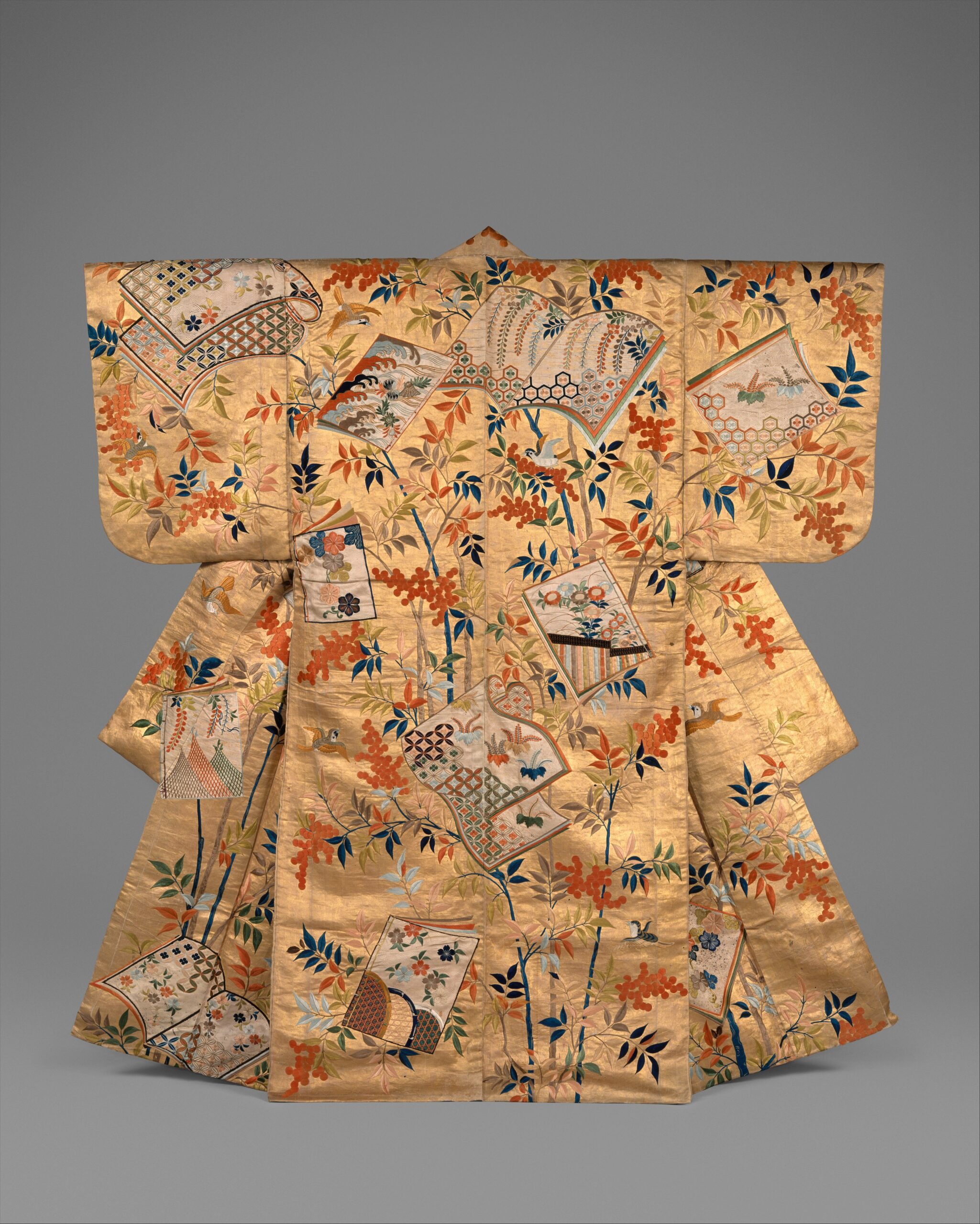 A Noh costume with motifs used for divine or supernatural beings, showing unique symbolic patterns that indicate otherworldly status