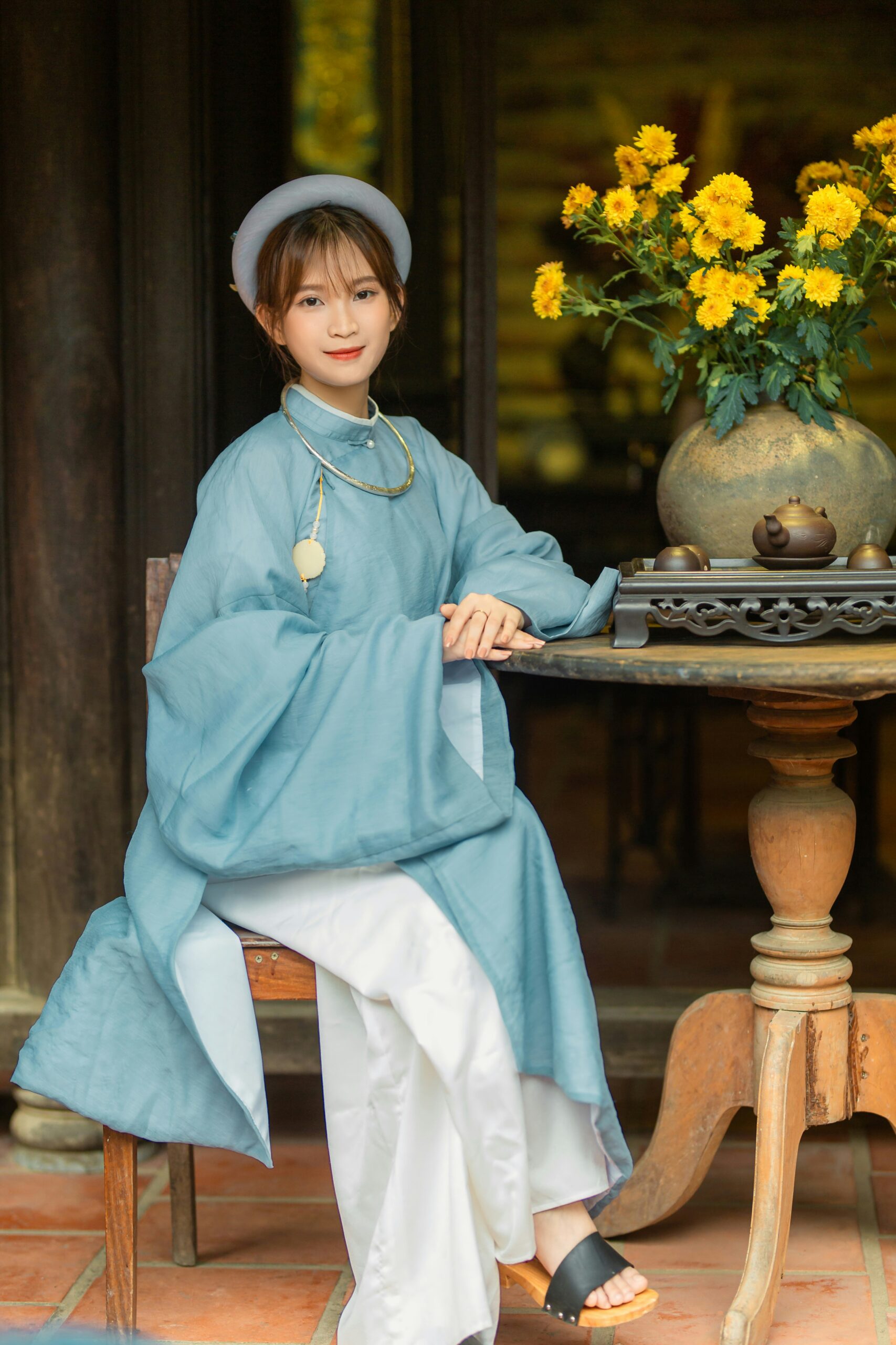 Back view of woman wearing traditional Japanese kimono with elaborate obi sash showing Edo period fashion and textile artistry
