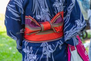 Kyoto kimono rental shop interior displaying colorful traditional Japanese clothing and accessories for tourists