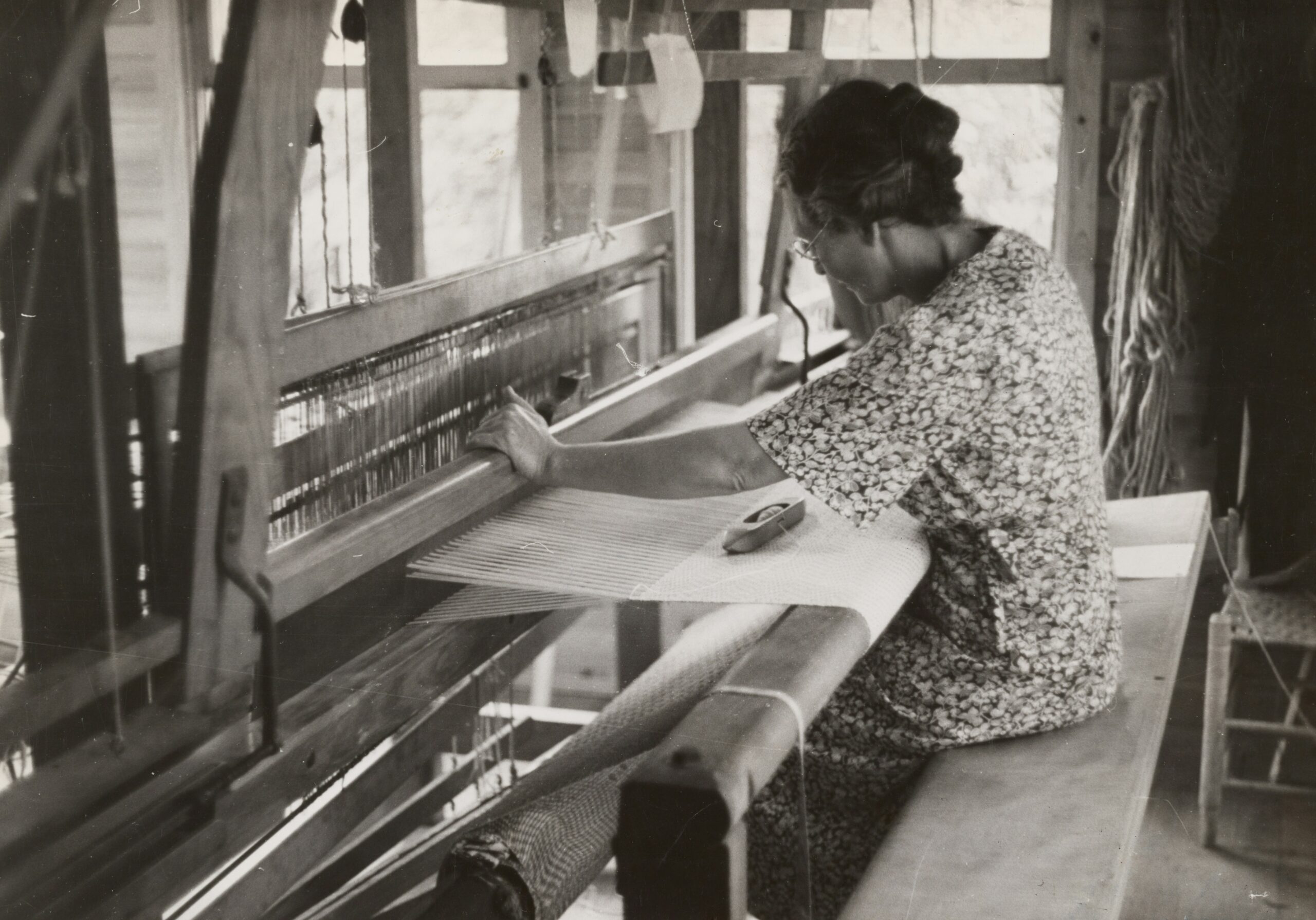 Traditional Kyoto artisan workshop scene showing master craftsmen creating elite kimonos with elderly Japanese artisans hand-painting yuzen patterns, silk dyeing vats, embroidery work in progress, traditional tools and techniques in warm-lit historic workshop setting