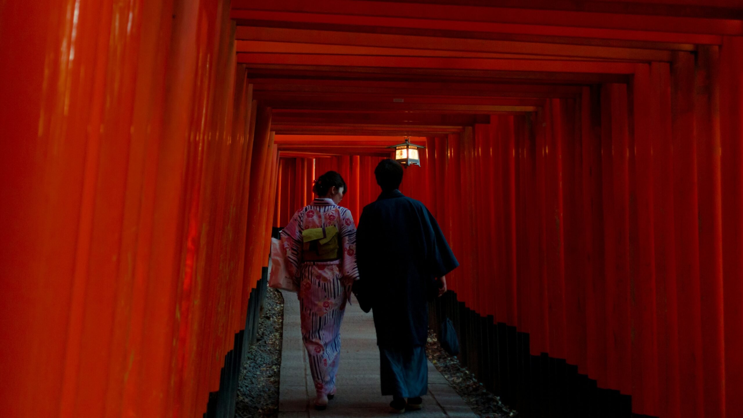 Famous red torii gates at Fushimi Inari Taisha shrine in Kyoto, a popular destination for New Year visits and prayers for business success
