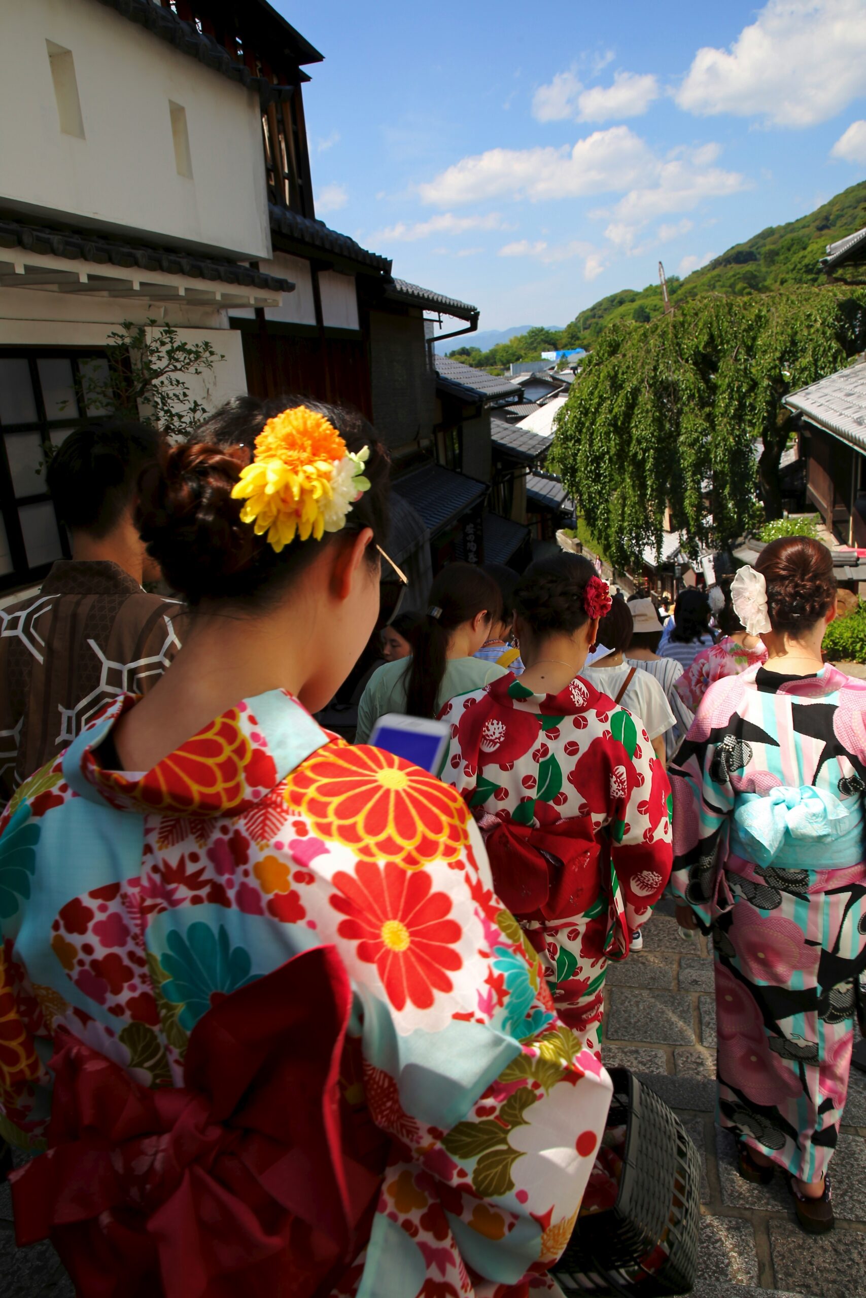 Traditional Japanese kimono from shogun era displaying intricate silk brocade patterns and ceremonial court dress symbolism