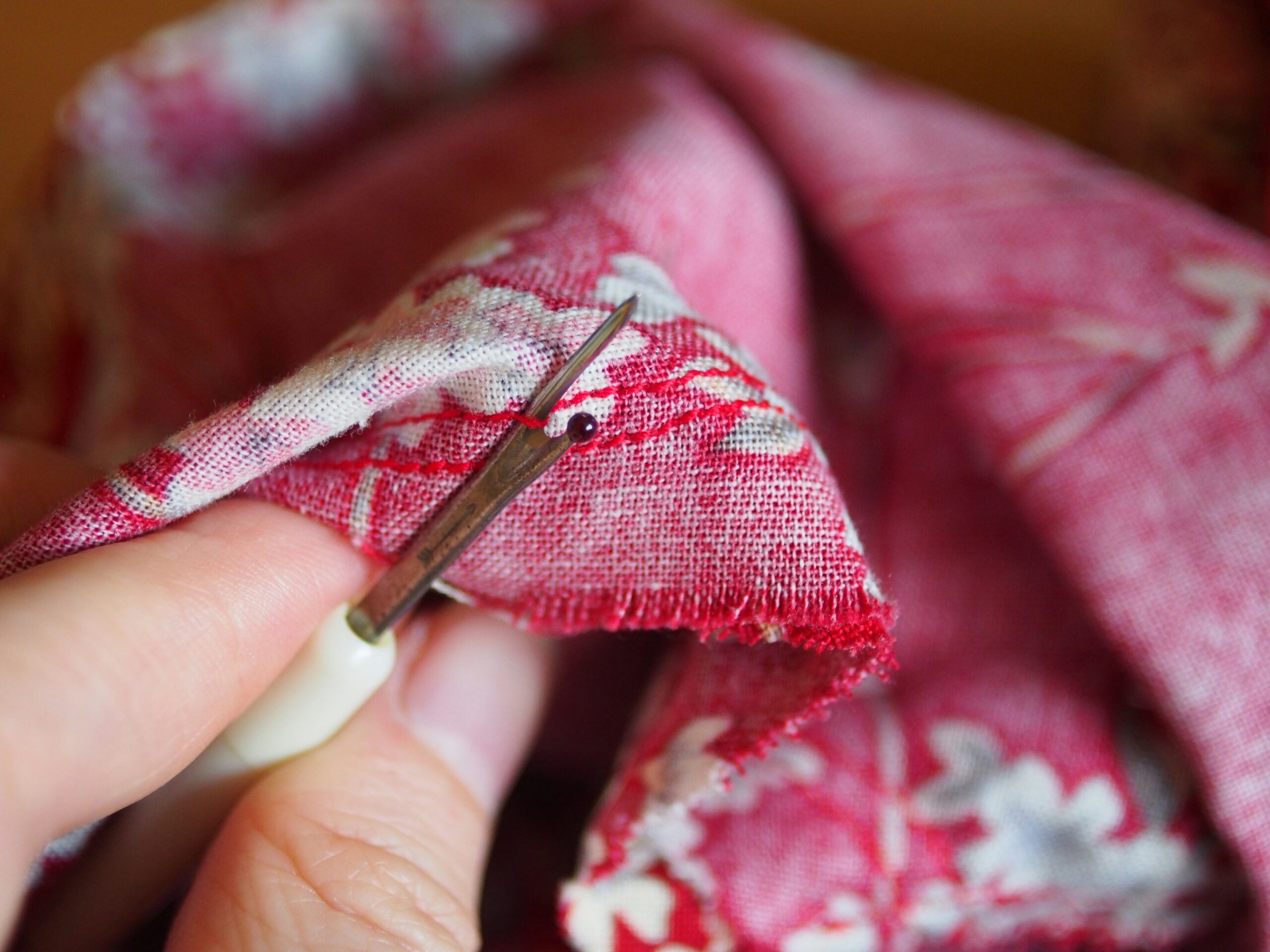 Exquisite Japanese kimono textile pattern featuring traditional motifs of cherry blossoms, elegant cranes, and pine trees in authentic oriental design with symbolic meaning