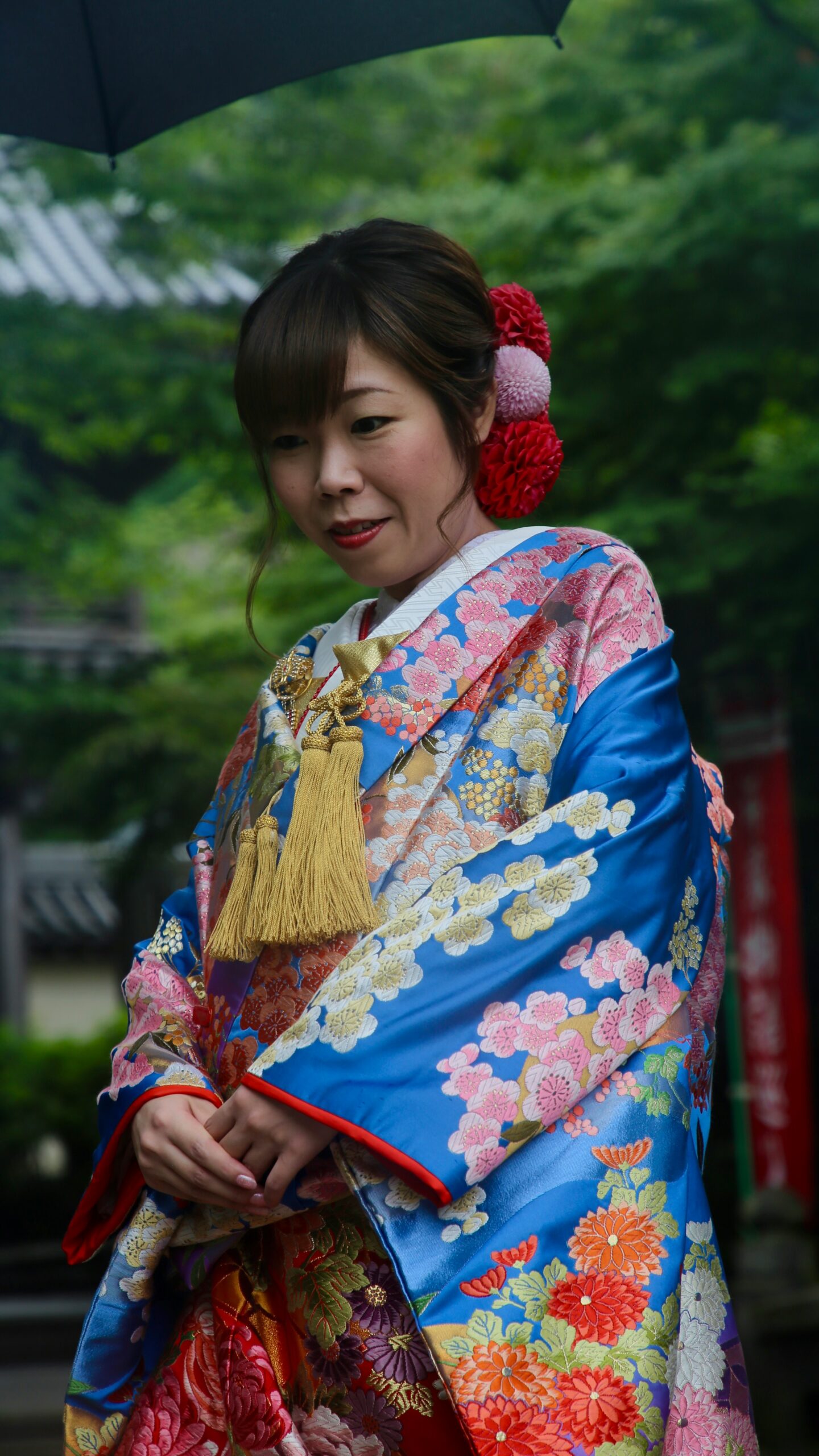 Women wearing traditional Japanese kimono walking on historic Kyoto streets near Yasaka Pagoda