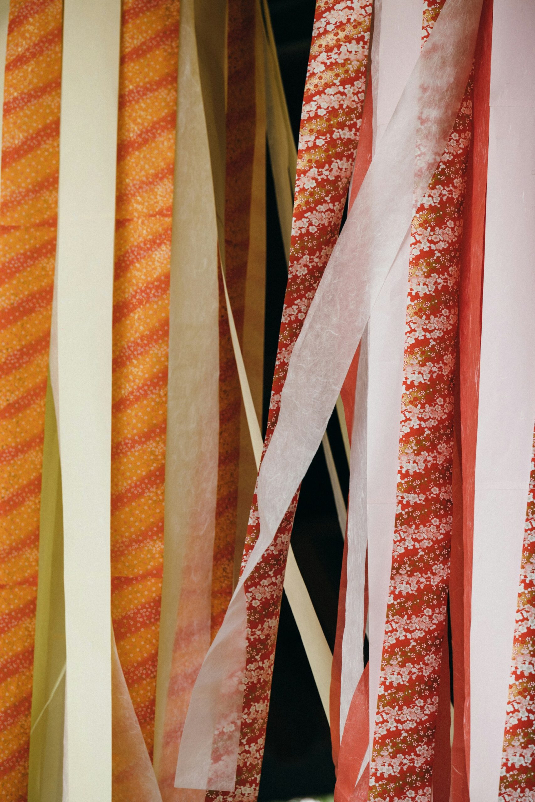 Intricate Japanese kimono fabric pattern featuring cherry blossoms, elegant cranes, and traditional ocean waves design symbolizing Japanese cultural heritage