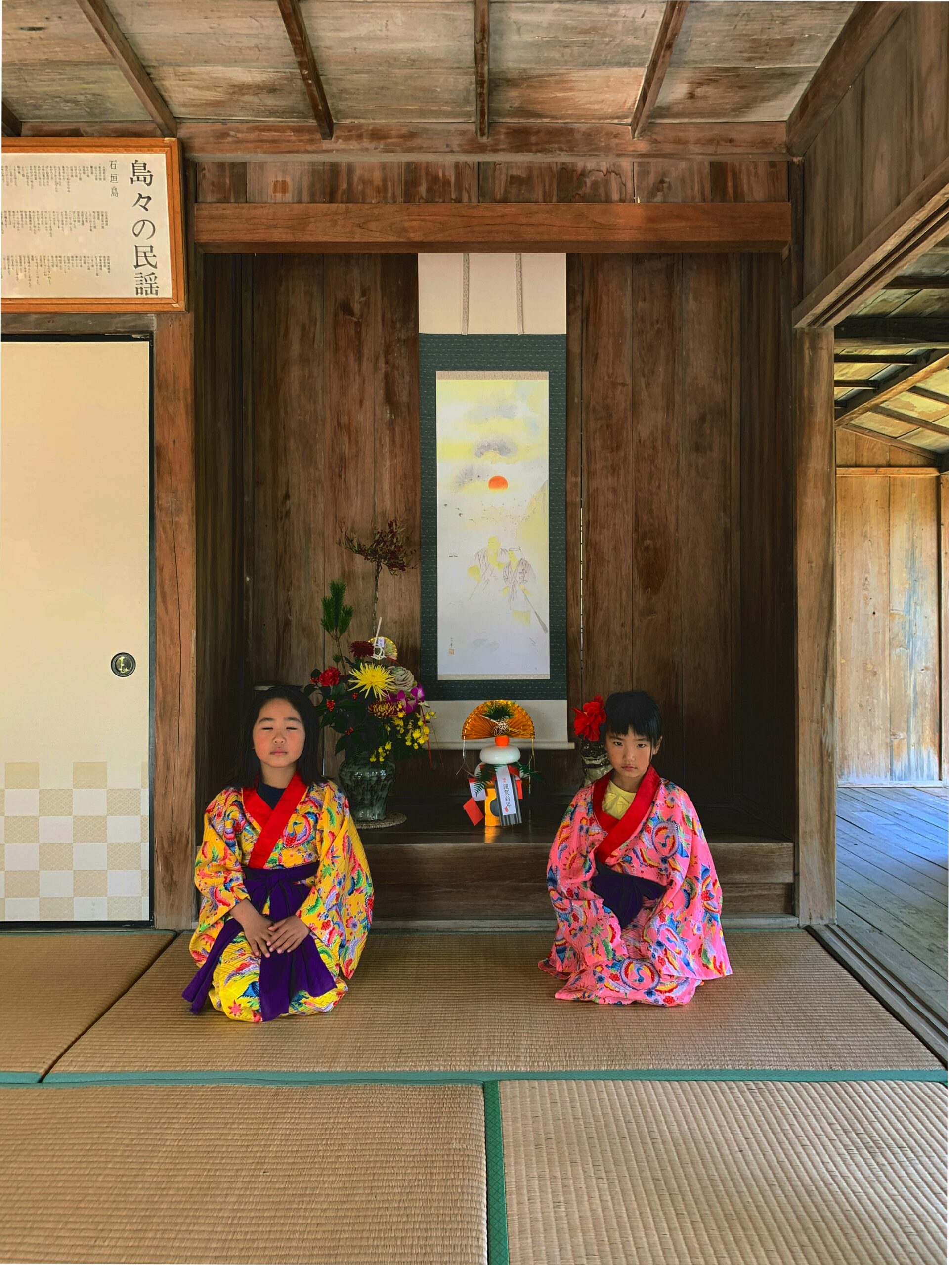Elegant kimono tea ceremony setup in traditional Japanese garden with beautiful women in colorful kimonos enjoying peaceful moment