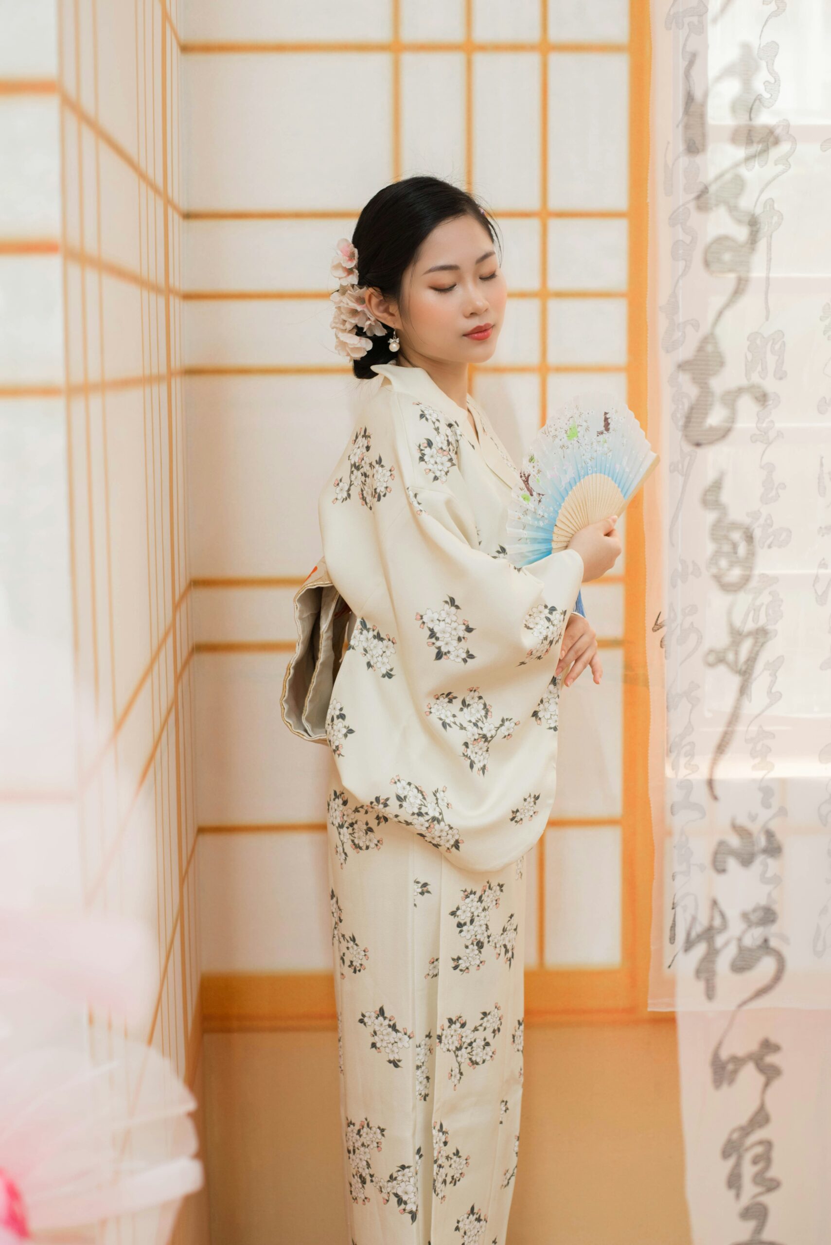 Multi-layered ceremonial kimono junihitoe displaying twelve layers of silk fabric in traditional Japanese court dress with intricate color combinations