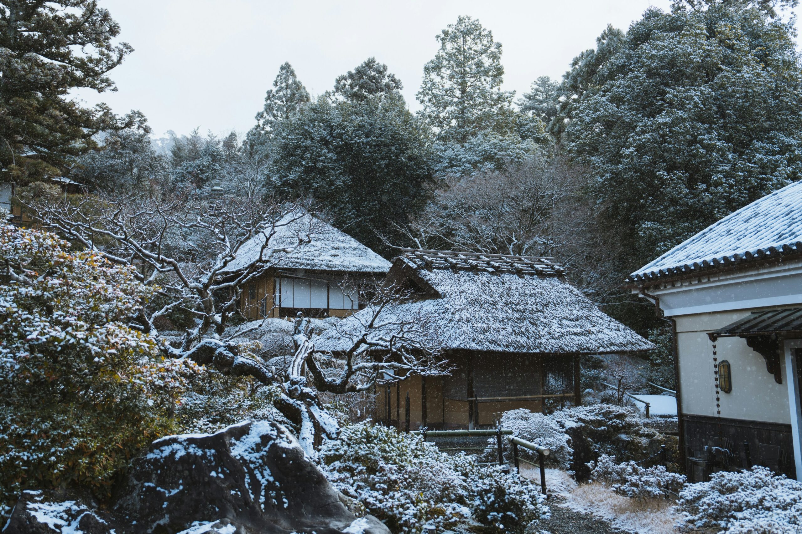 Minimalist Japanese Zen garden at Ginkaku-ji temple in Kyoto with raked gravel patterns representing emptiness and meditation